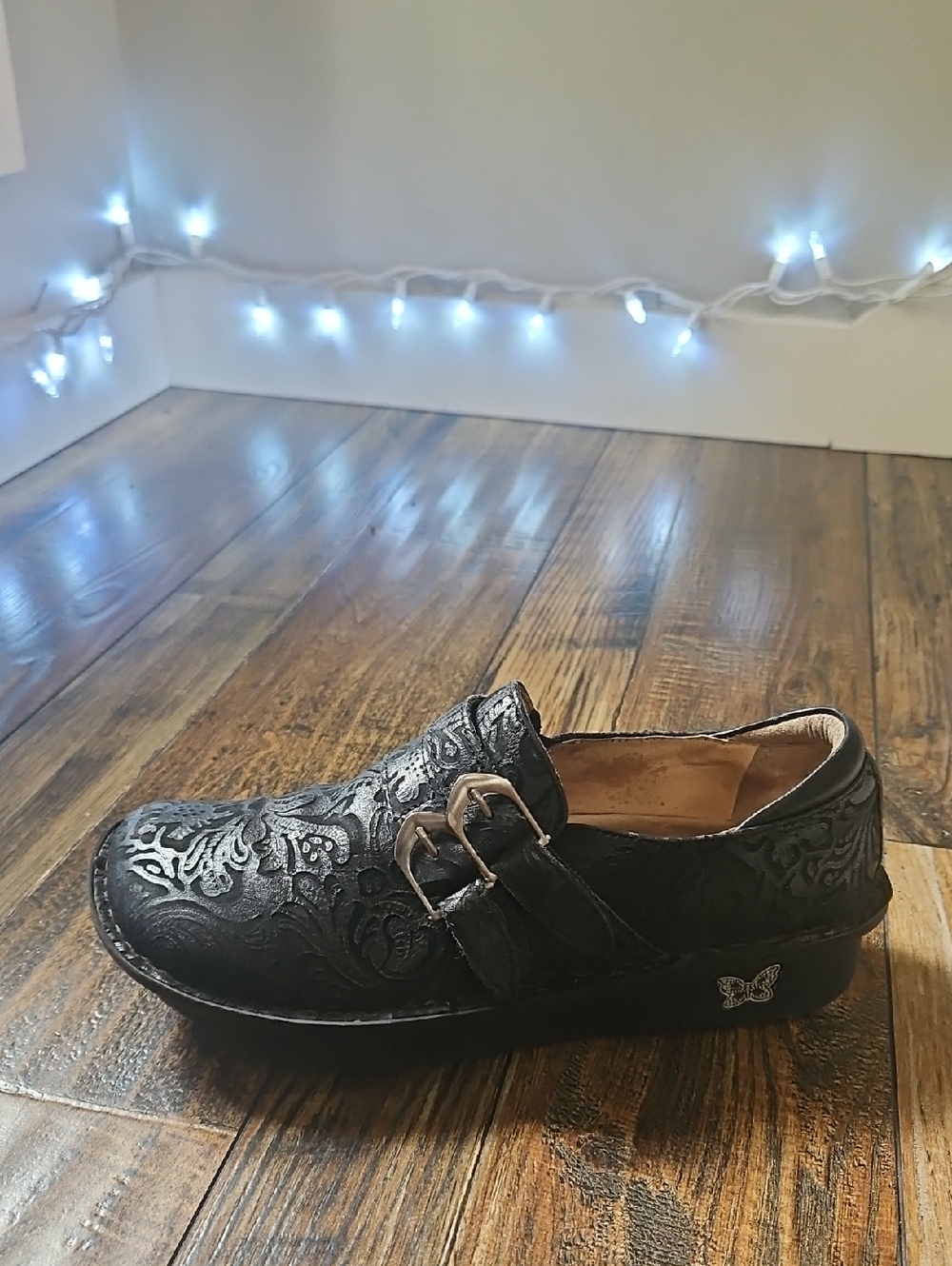 Alegria Black Embossed Buckle Clog